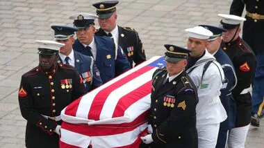 Trump spotted Graham funeral