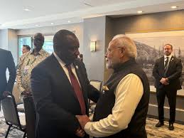 PM Modi holding hands Pezeshkian